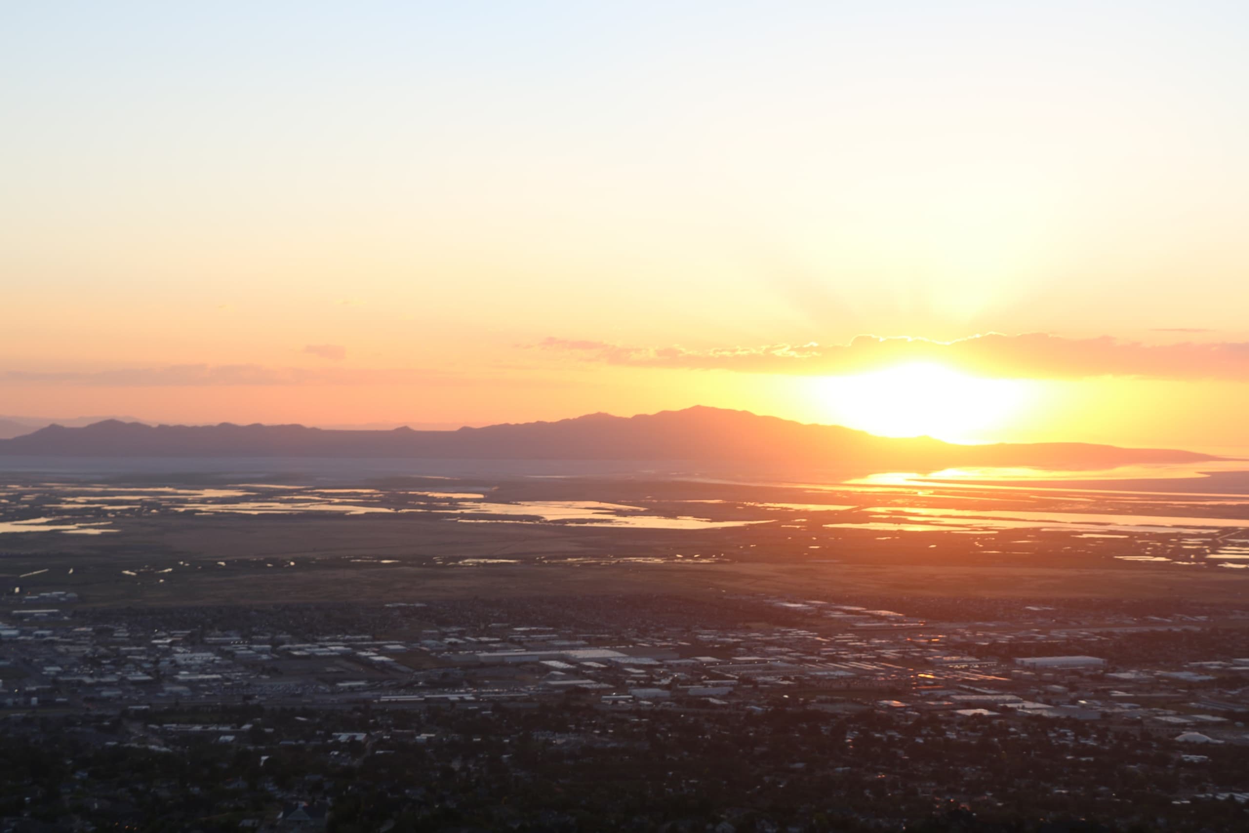 Sunset over Utah valley and Great Salt Lake with panoramic view