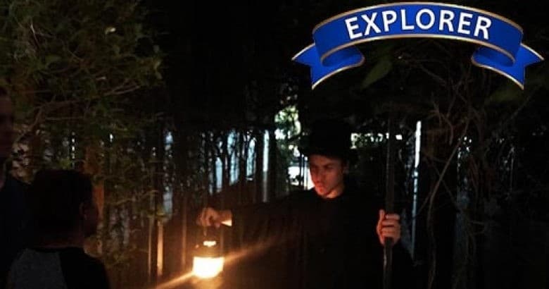 Night lantern ghost tour in wooded trails, explorer outdoor experience