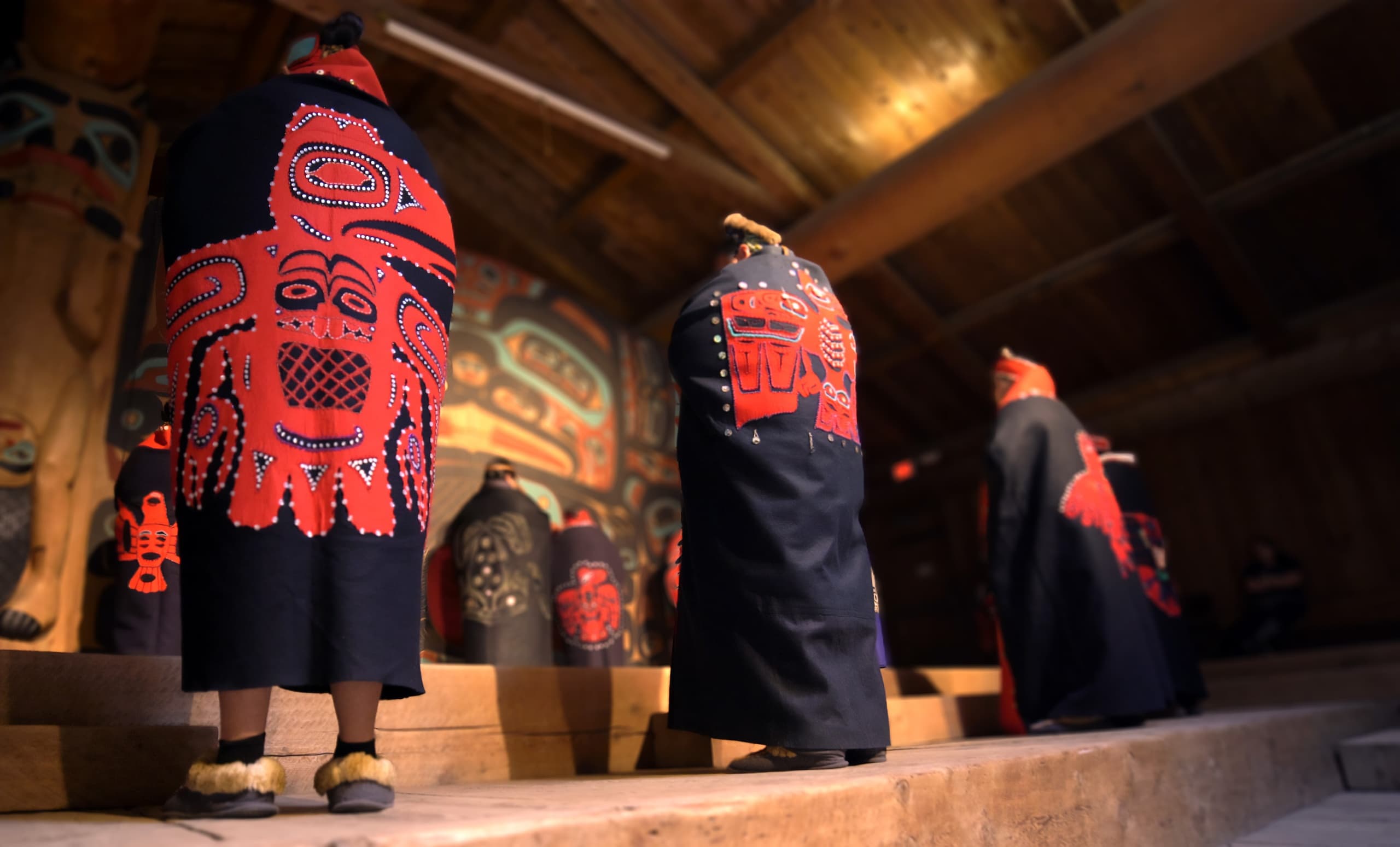Cultural dance ceremony inside tribal longhouse in Ketchikan