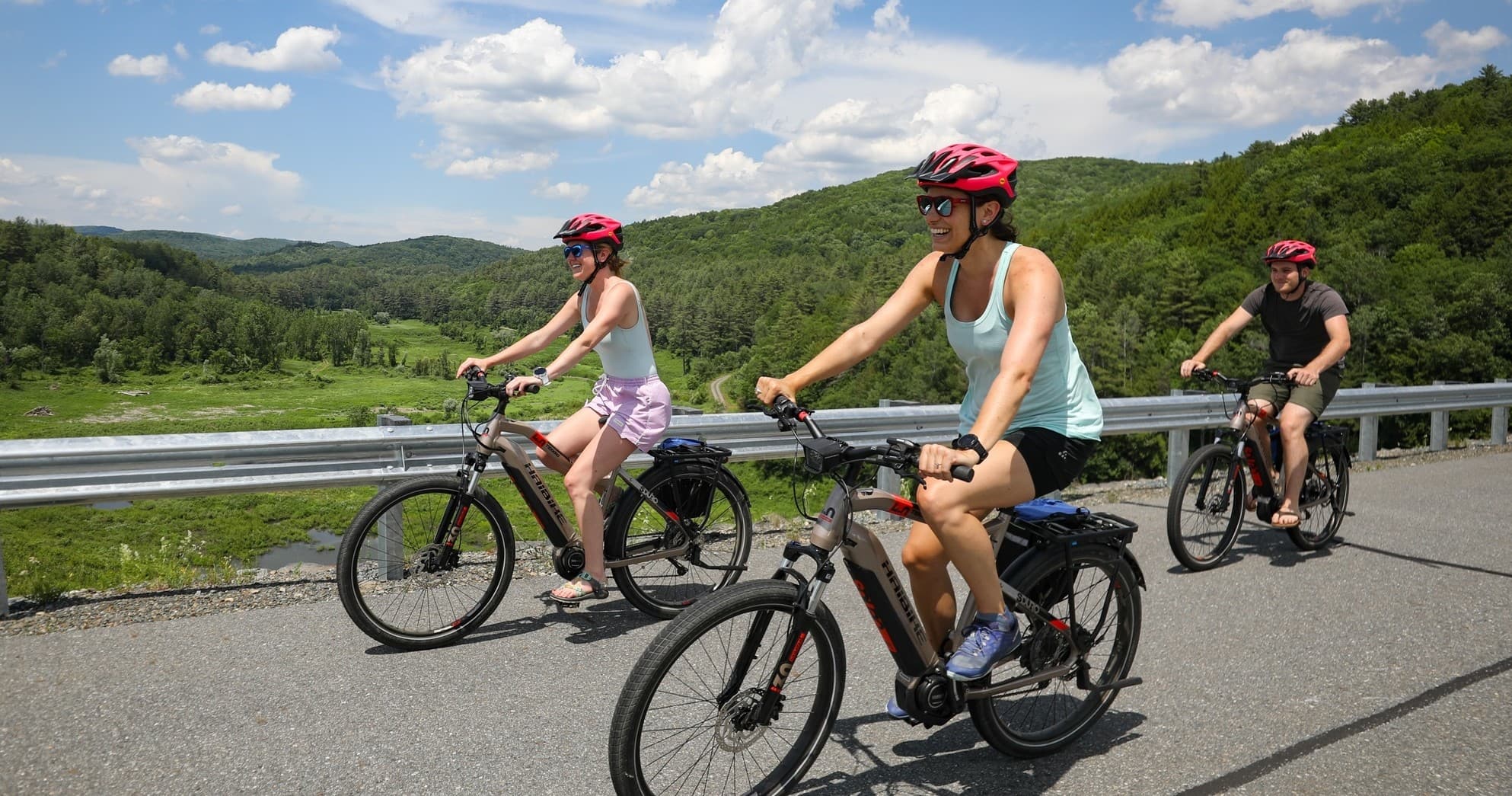 Road cyclists riding together on scenic Vermont country road