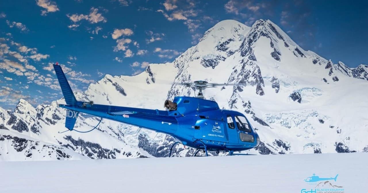 Soar Over Glacier Country: Helicopter Adventure with Snow Landing in Franz Josef