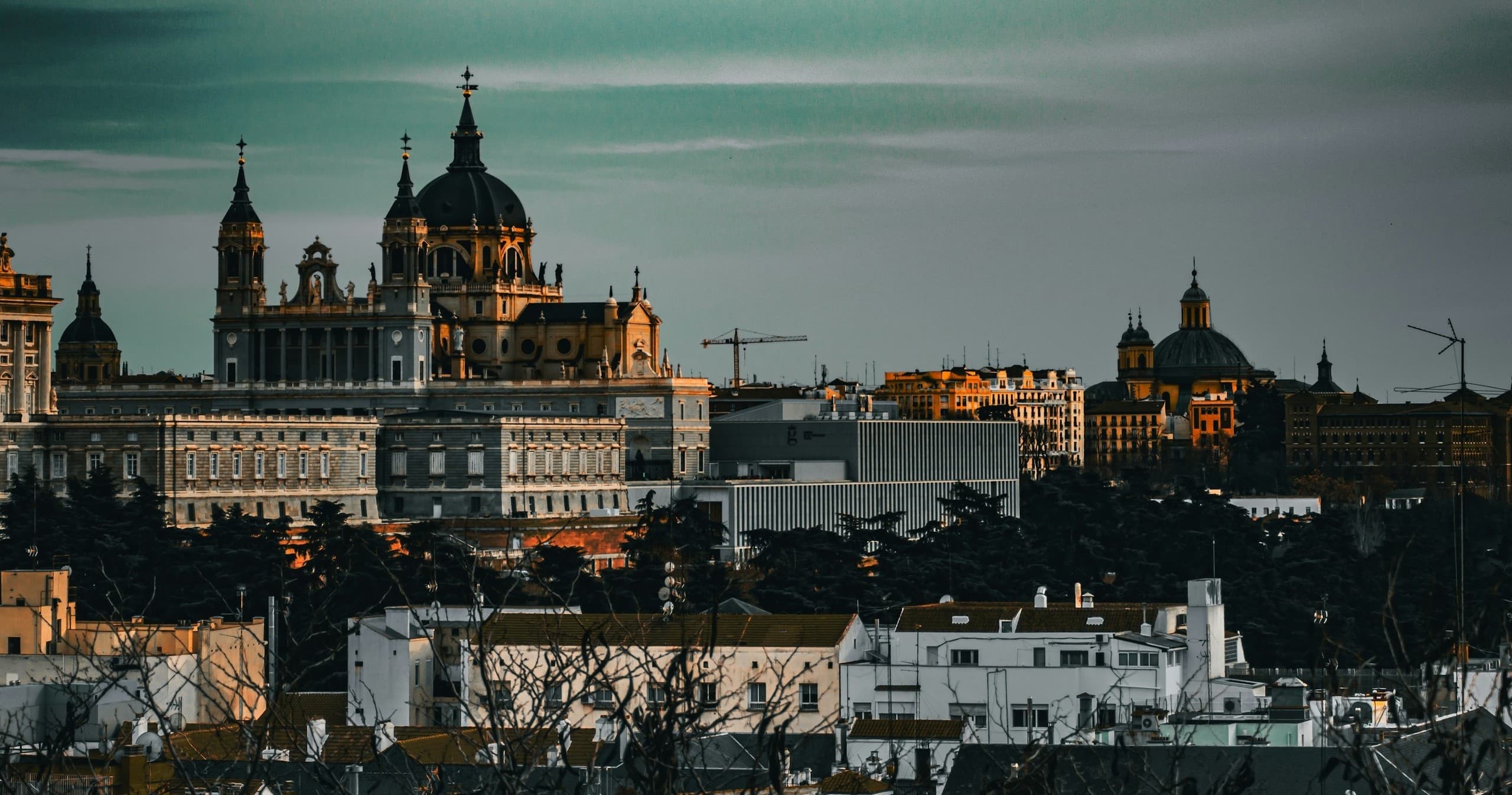 Madrid skyline with Royal Palace and Almudena Cathedral at sunset