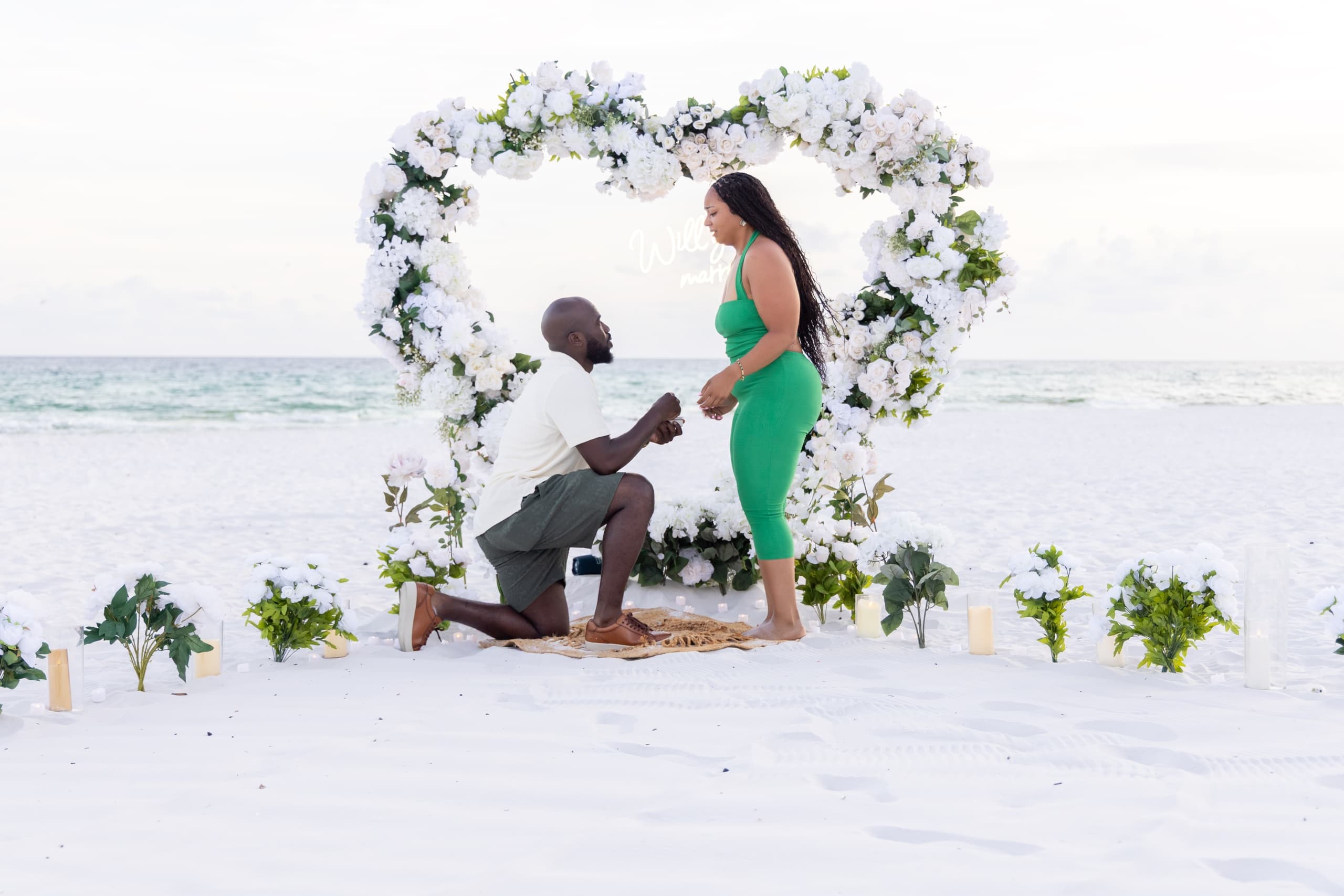 White Heart Beach Proposal in Destin: LED Heart, Roses and Candlelit Aisle on the Gulf photo 1
