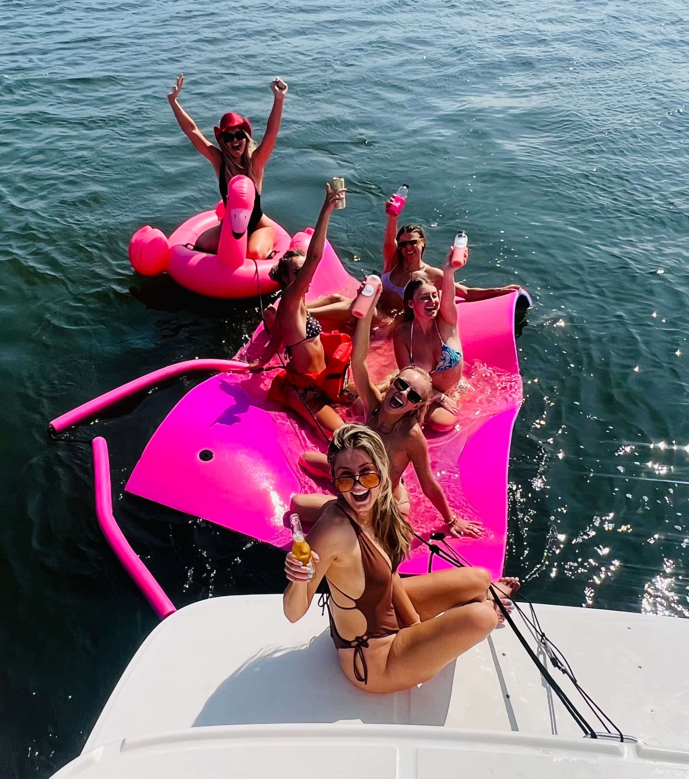 Water Activities & The Co-Op Boat Charter: Sun, Dolphins & Sunset Adventures