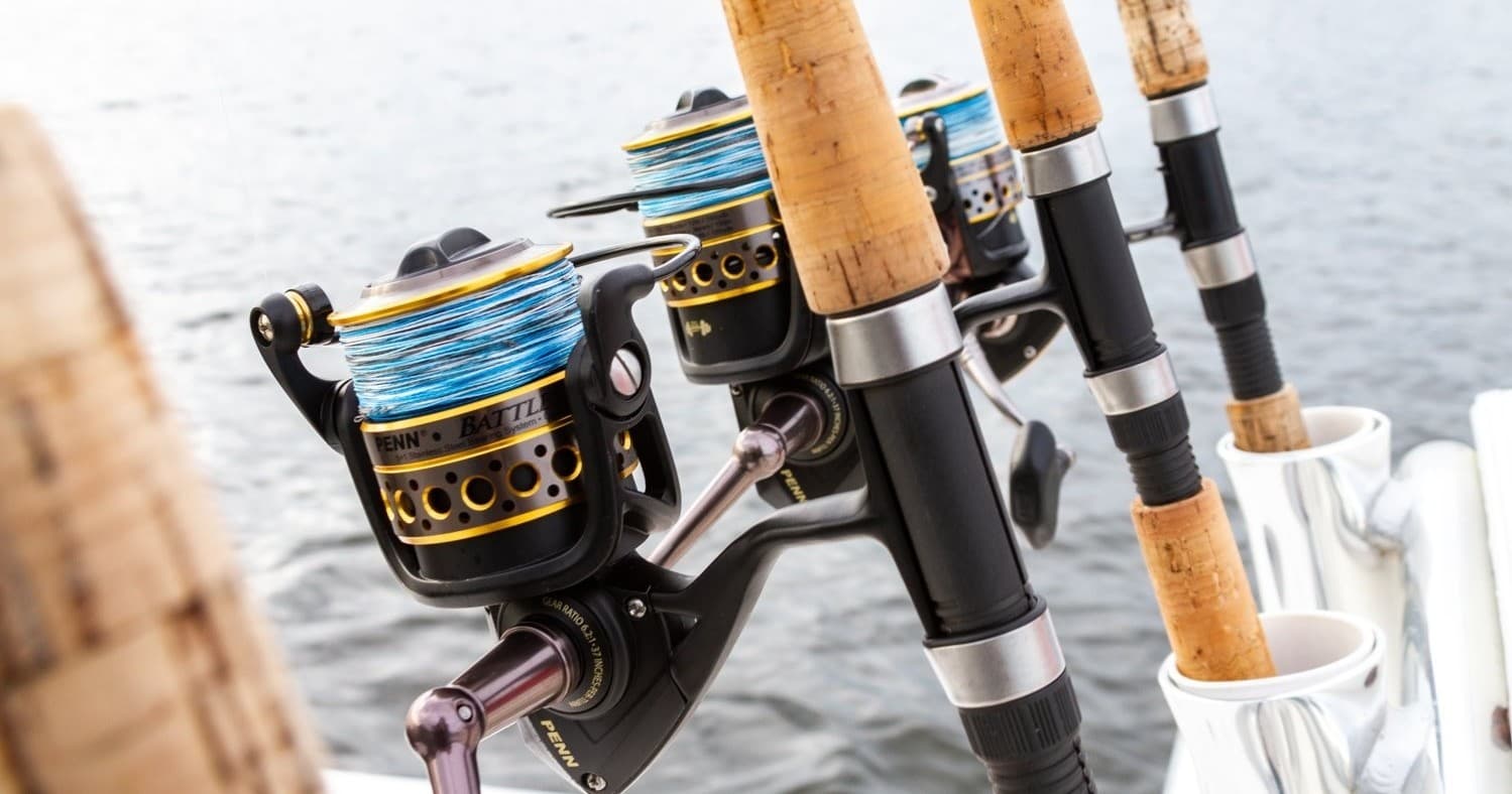 Close-up fishing rods and reels on boat ready for offshore trip