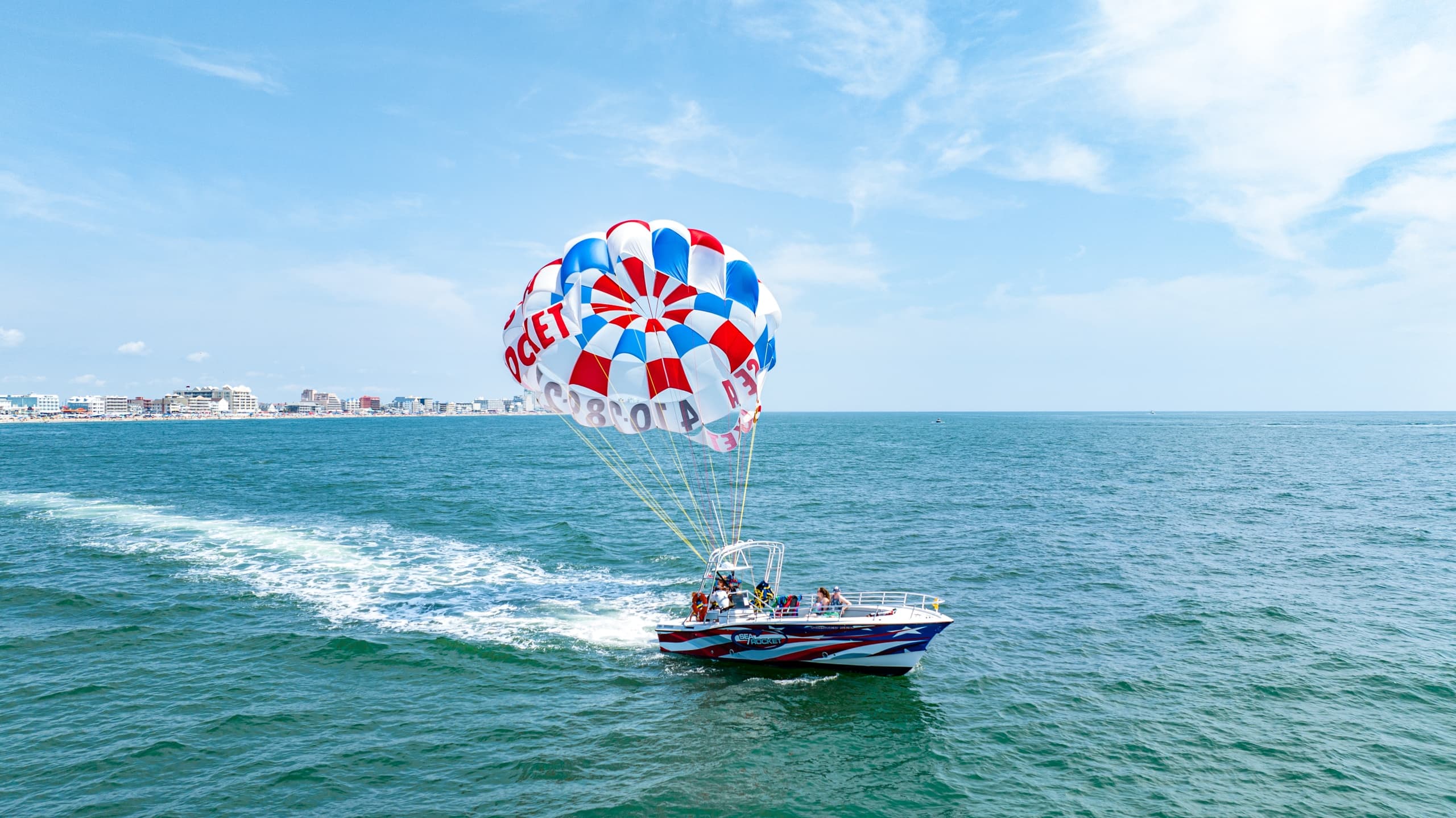 OCEAN PARASAILING & FREE SPEED BOAT CRUISE COMBO PACKAGE