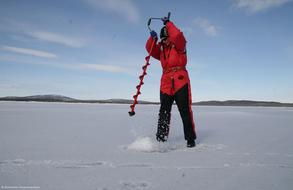 Ice Fishing Safari with Lapponia Tours in Finnish Wilderness