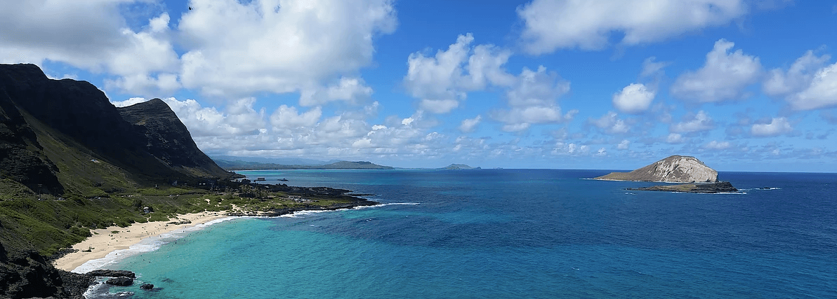 Panoramic ocean vista of Oahu beach showing turquoise bay