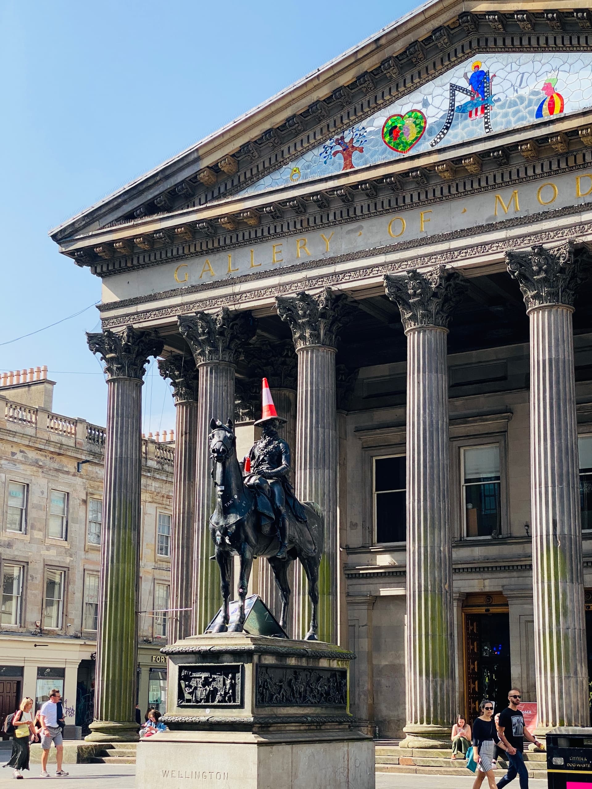 Urban heritage tour at neoclassical gallery with equestrian statue