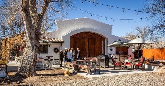Outdoor winery patio with tasting tables at Clear Creek AZ