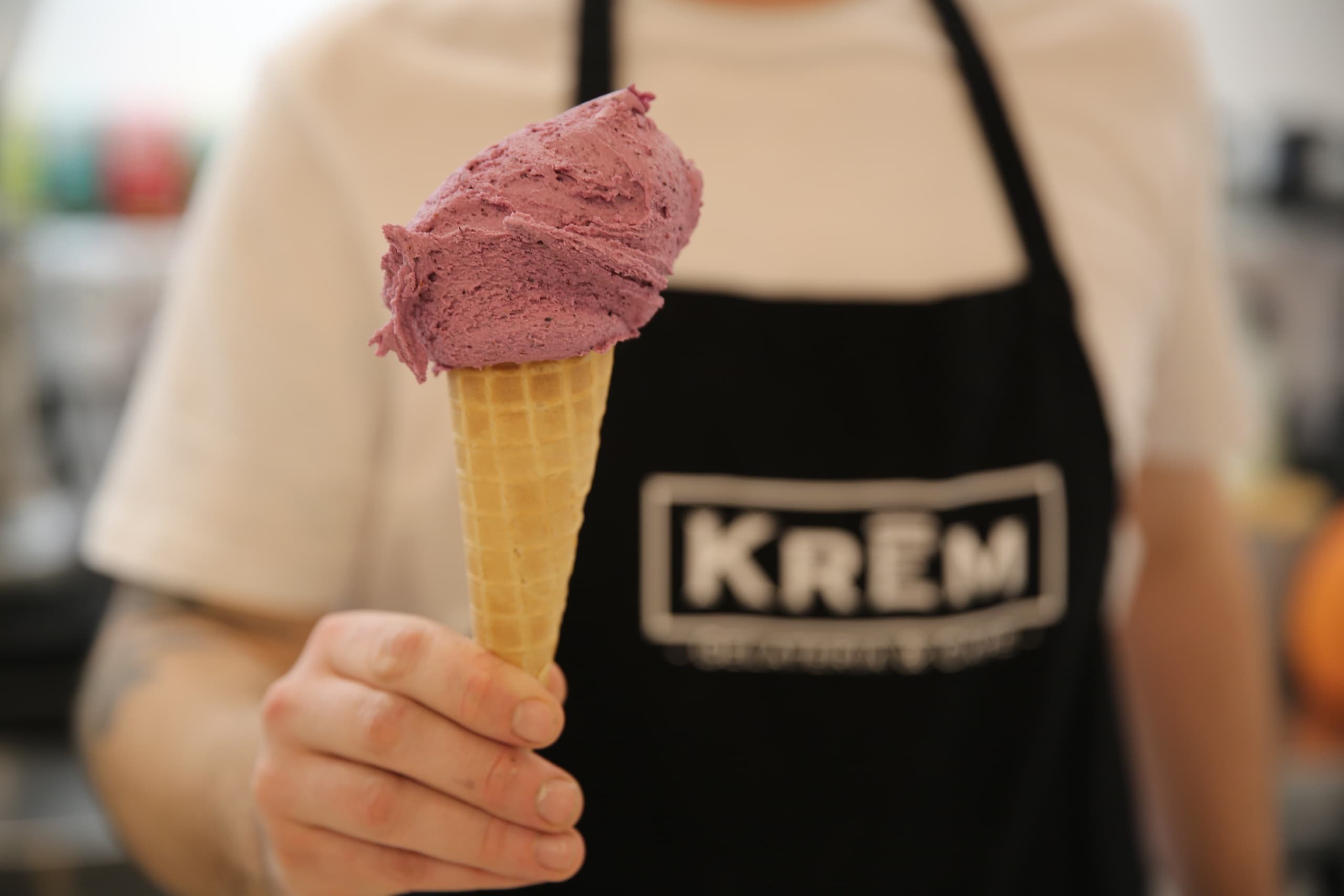 Server offering artisan ice cream cone on Westport food tour