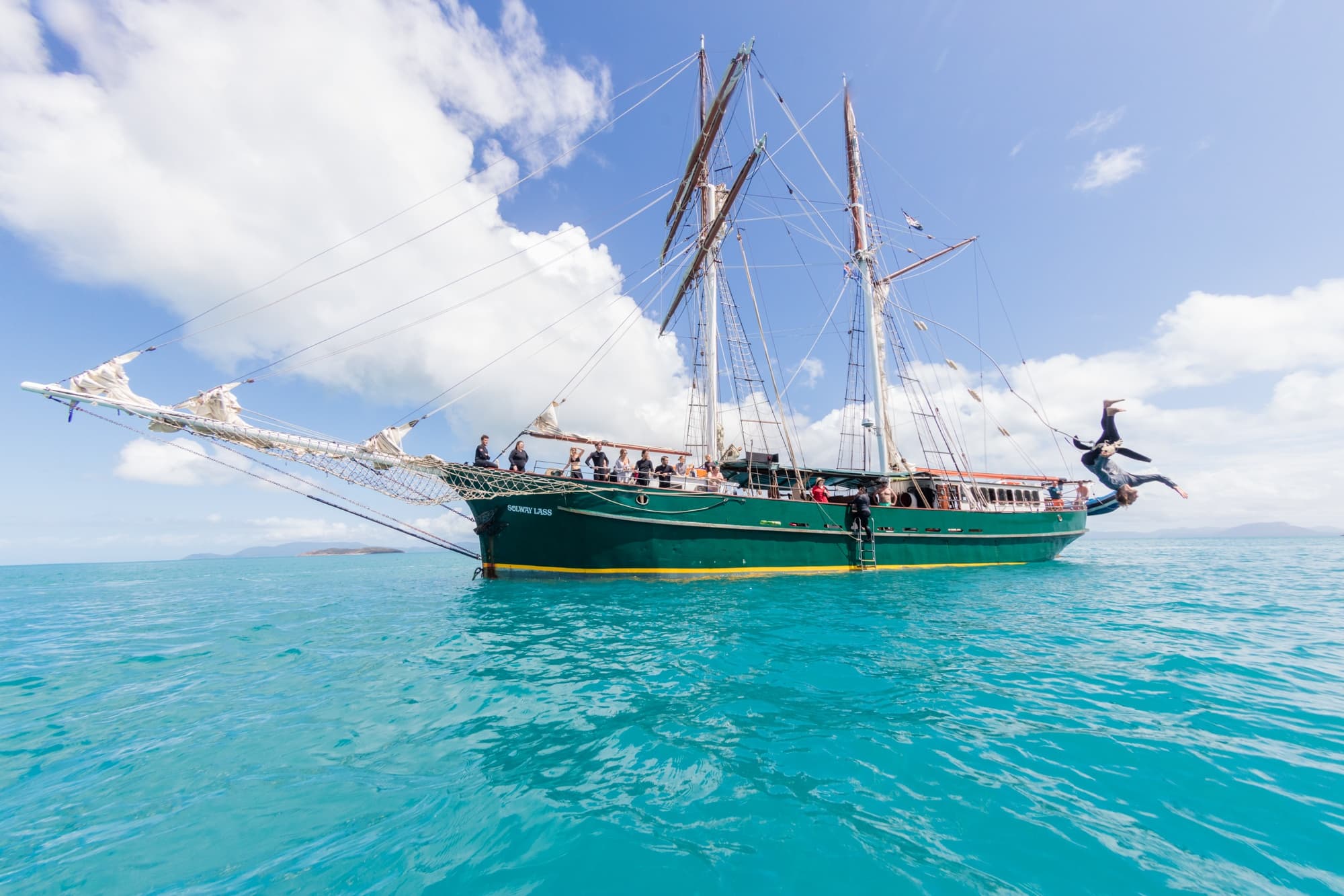 Historic tall ship sailing turquoise Whitsunday Islands waters