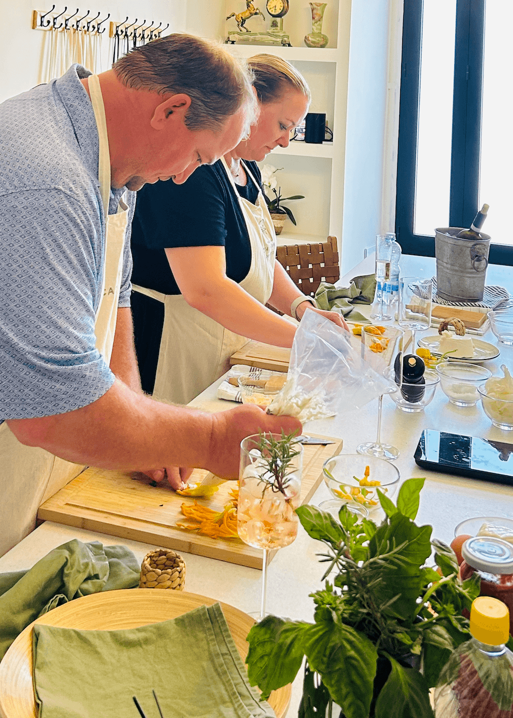 Sorrento cooking class in an indoor kitchen preparing pasta