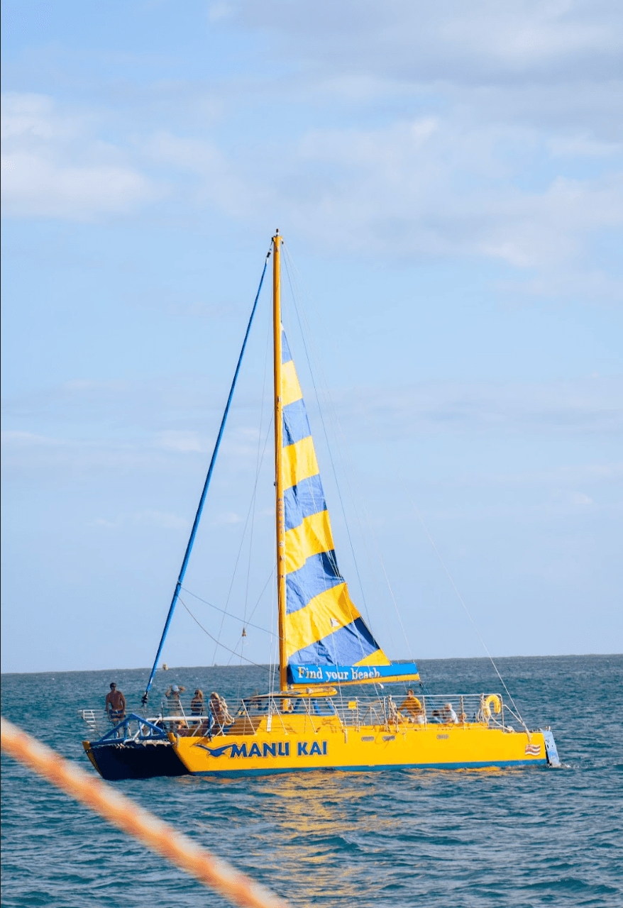 Sunset Sail in Honolulu: Manu Kai Harbor Catamaran Cruise and Green Flash Viewing