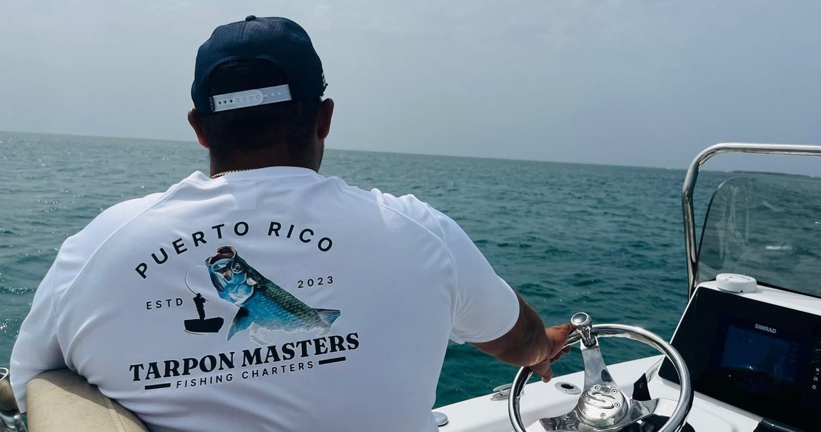 Charter captain steering offshore boat near Puerto Rico waters