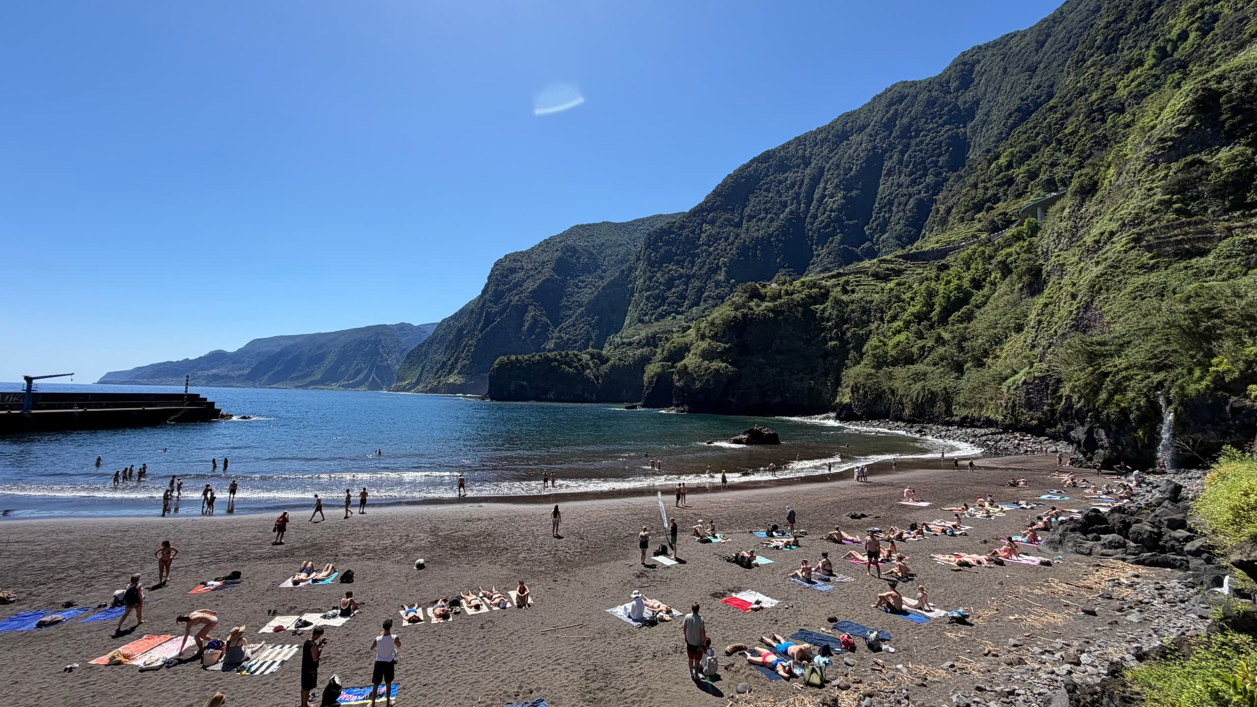 Rocky headland and turquoise sea from cliff viewpoint, Madeira
