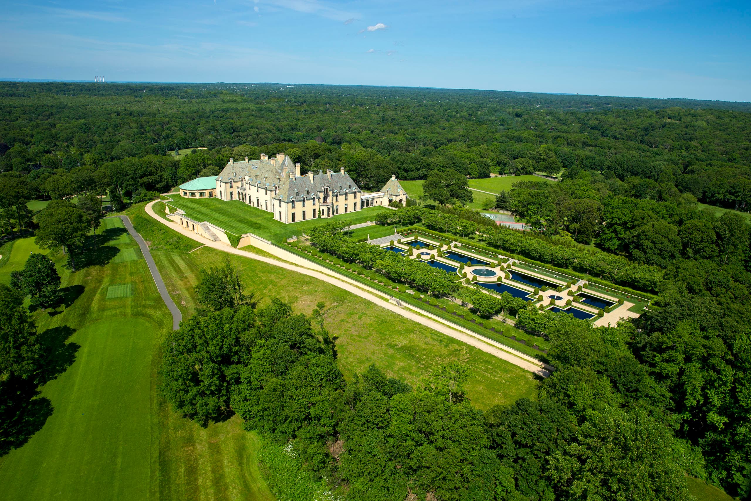 Aerial view of Oheka Castle estate and wooded grounds, Long Island