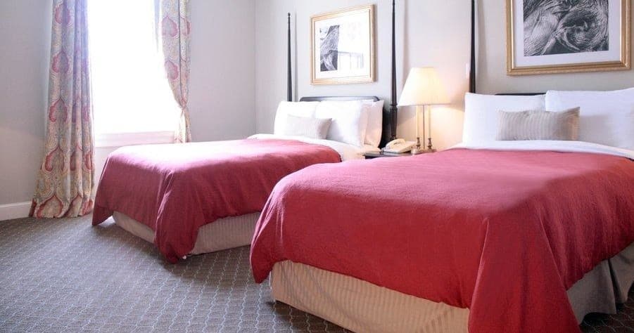Twin-bed hotel room interior at Natural Bridge lodging near park
