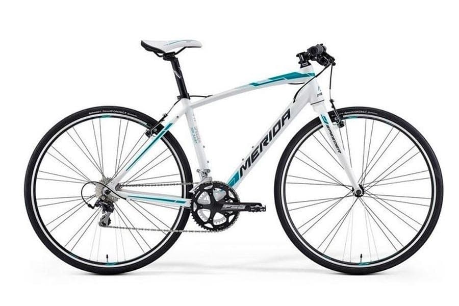 White teal road bike studio shot on white background for cycling tours