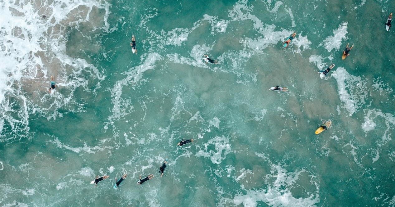 Group Surf Lessons with King Neptunos Surf School in Estombar