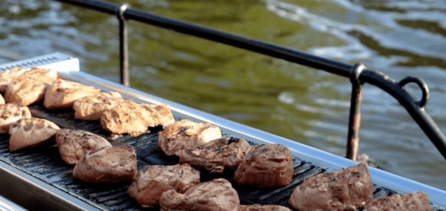 Savor Scenic Canals with the Ultimate BBQ Boat Cruise in Amsterdam