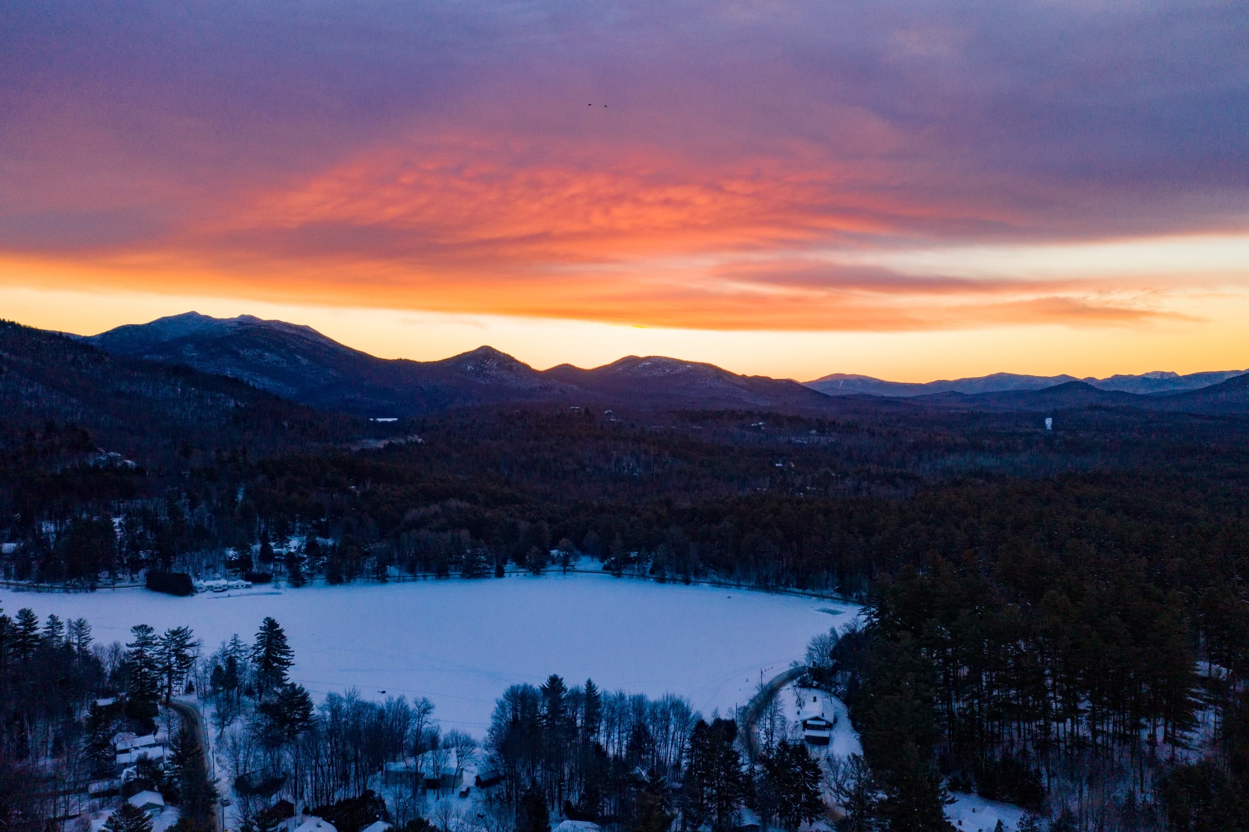 Guided Sunset Snowshoeing in Saranac Lake — Adirondack Sunset Snowshoe Tour photo 1