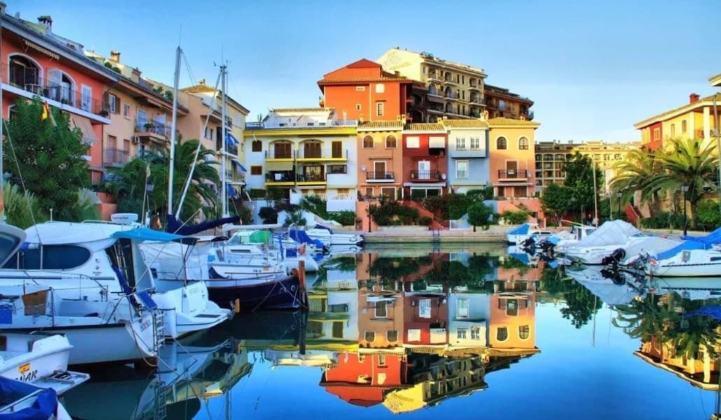 Scenic marina with colorful waterfront reflections in harbor