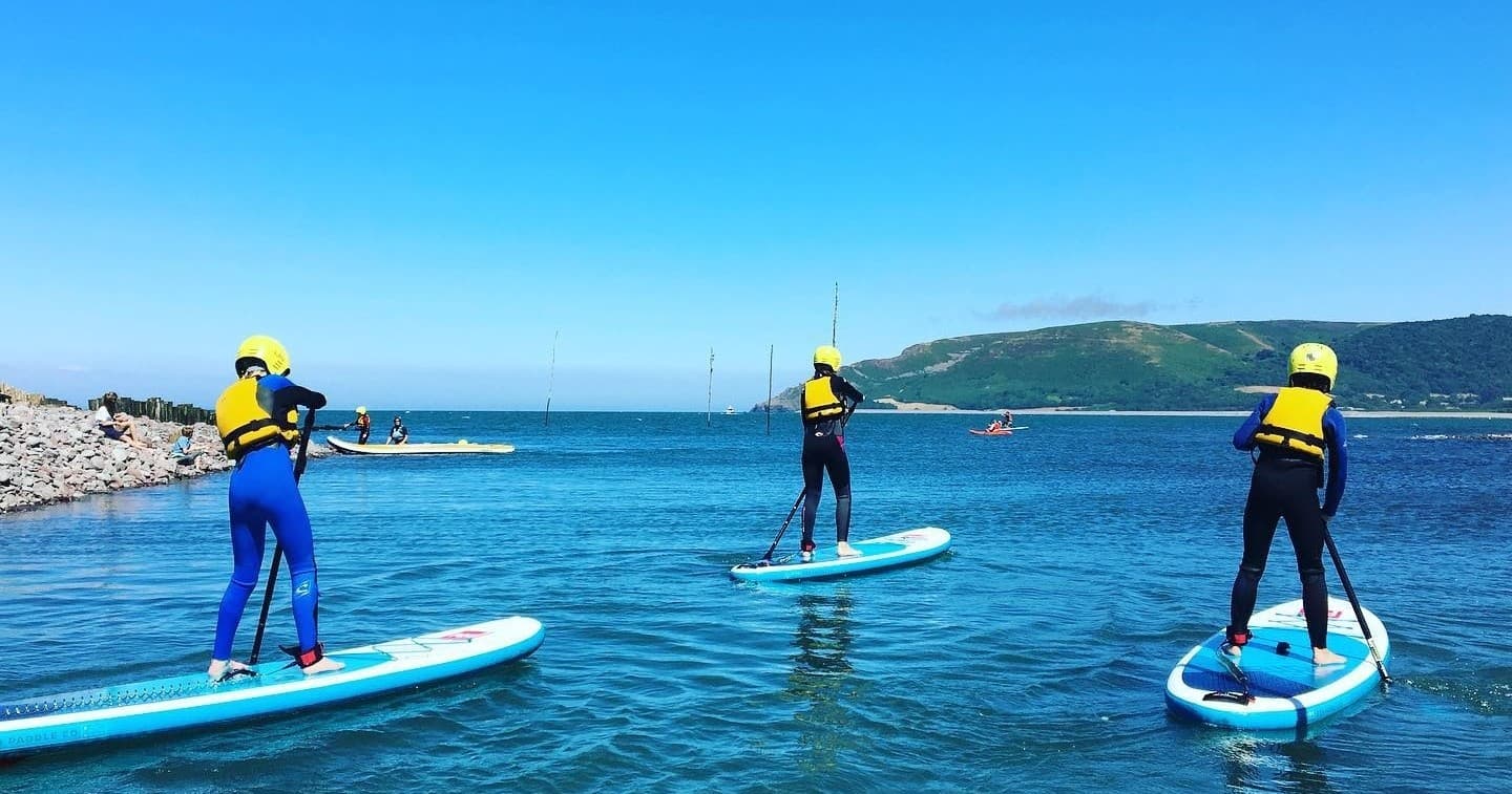 Stand-up Paddleboarding with Exmoor Adventures at Porlock Bay