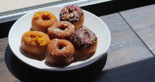Savor the Flavors: New Orleans Historic Donut & Beignet Tour Along Magazine Street