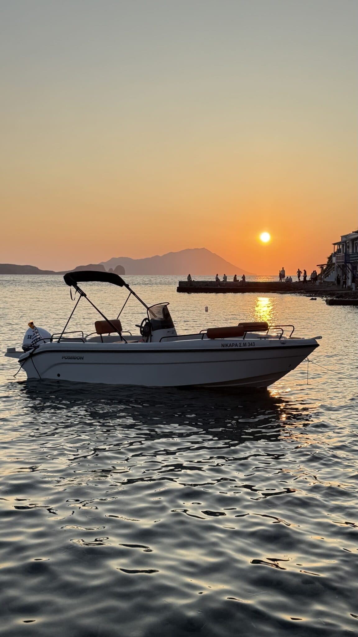 Explore Milos by Private 6m Boat: No-License Coastal Adventure to Caves & Secret Beaches