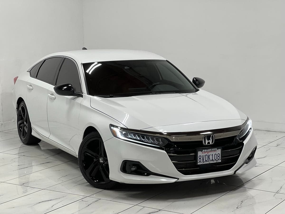 Cruise West Palm Beach in a White Honda Accord with Premium Sport Red Interior