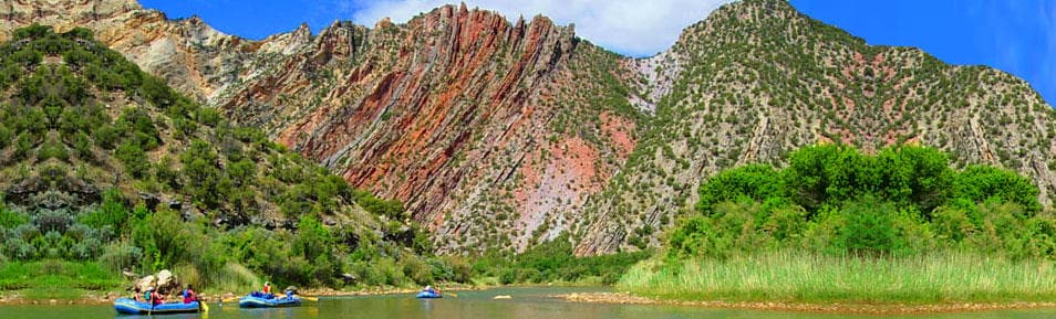 Scenic rafting on green river through colorful canyon vistas