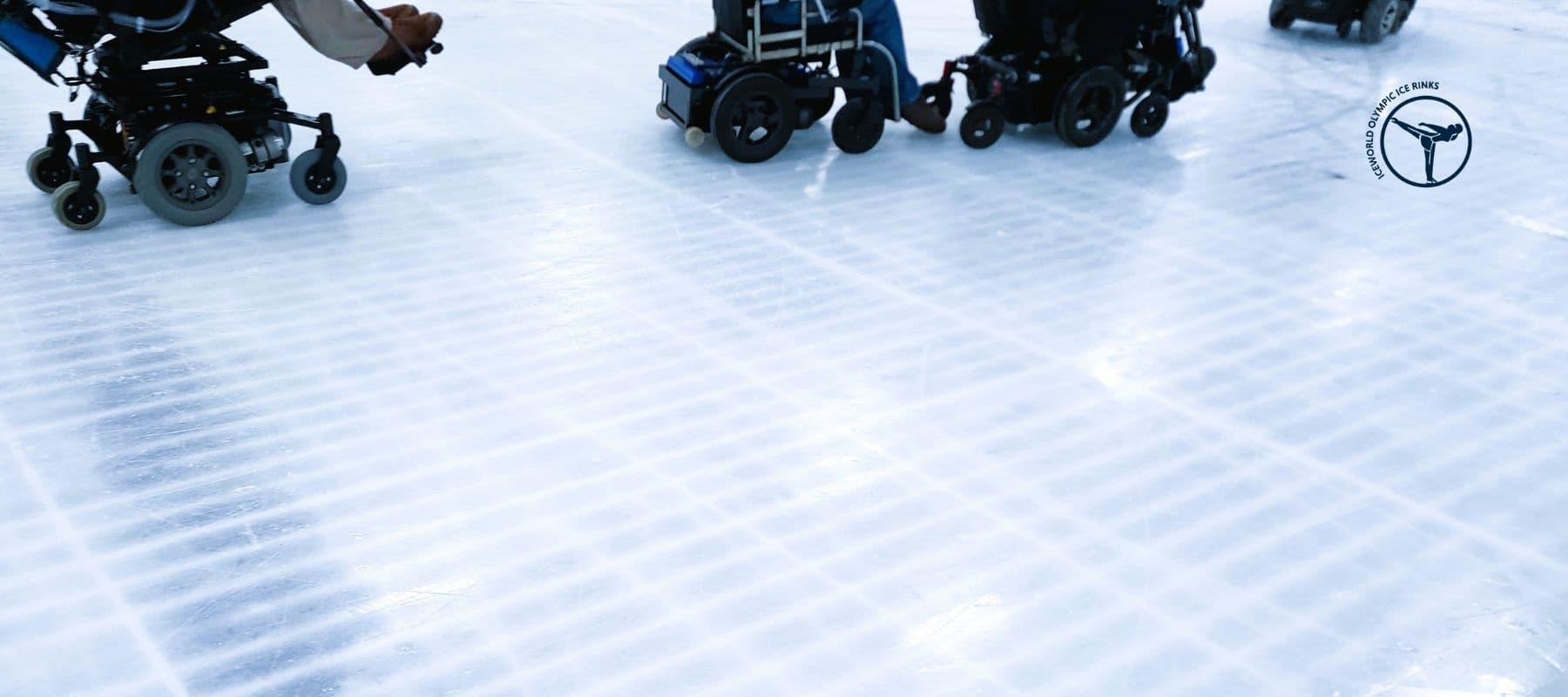 Close-up ice surface with skates and equipment at Iceworld rink