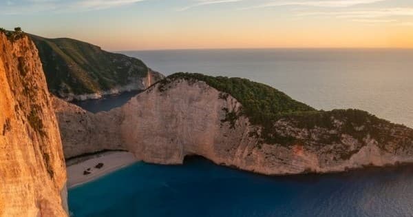 Sunset Cruise to Marathonisi, Keri Caves & Marathias Beach