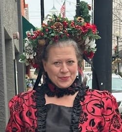 Costumed guide in historic downtown leading McDonough ghost tour