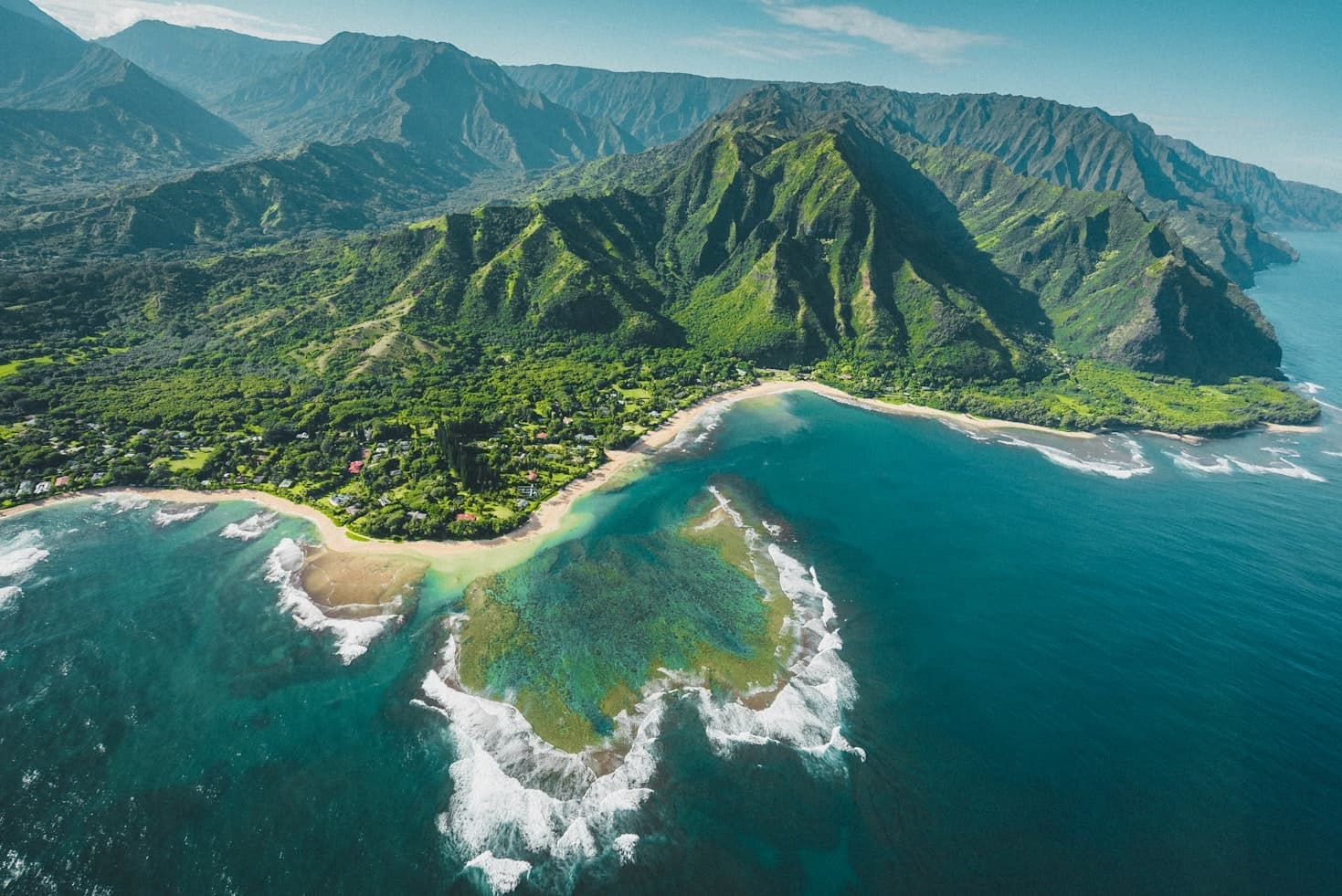 Aerial coastline view with turquoise bays and rugged cliffs