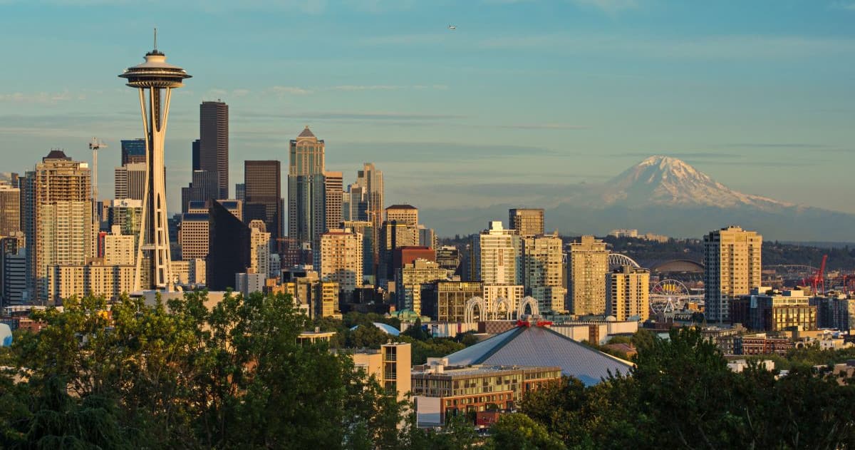 Panoramic Seattle skyline and Mount Rainier view at golden hour