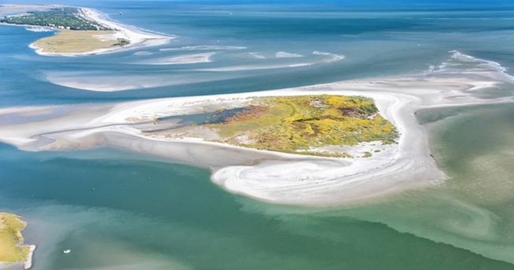 Aerial view of coastal sandbars and turquoise ocean beaches