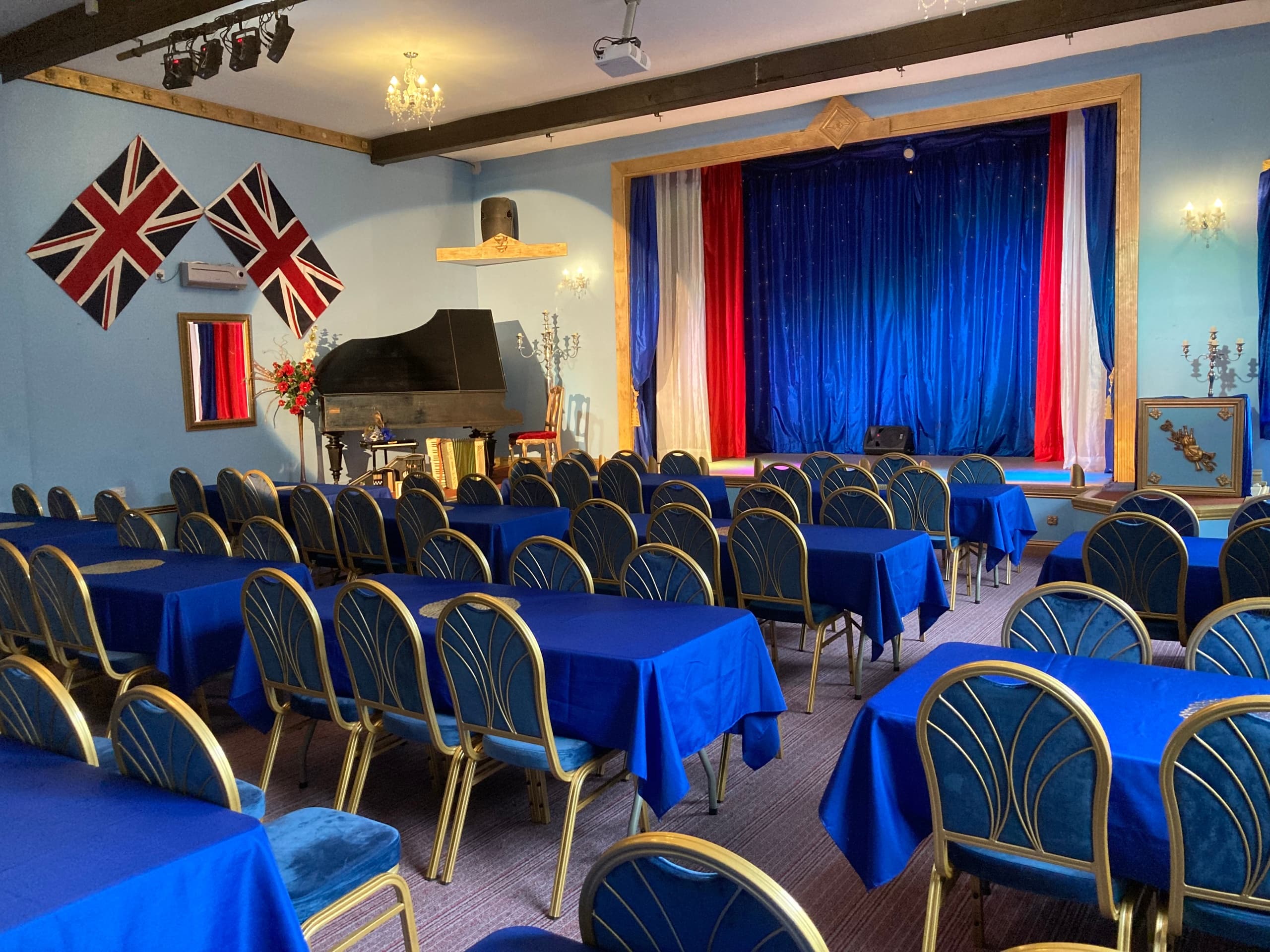 Community hall auditorium with stage and seating set for events