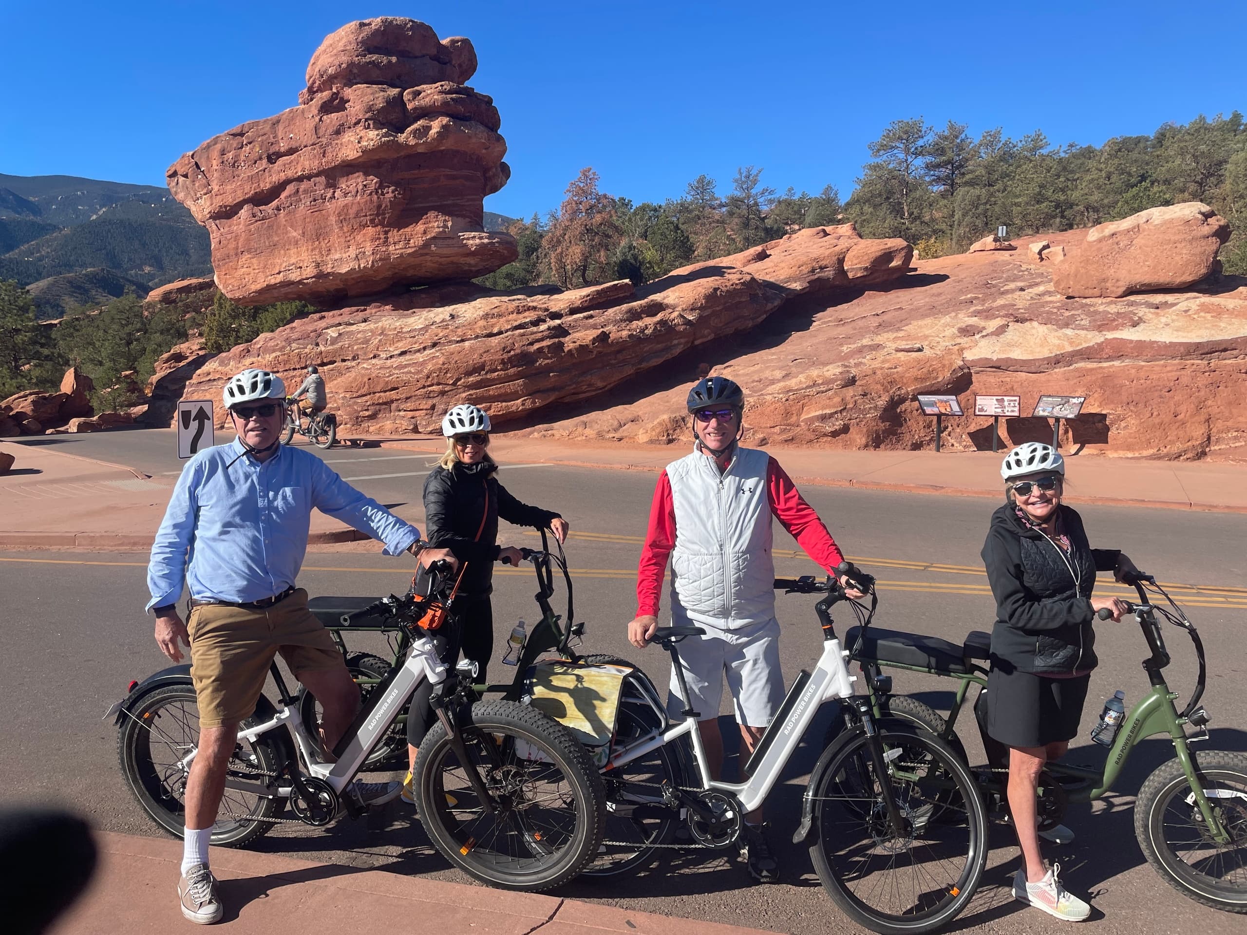 Group e-bike tour with red rock formations at park