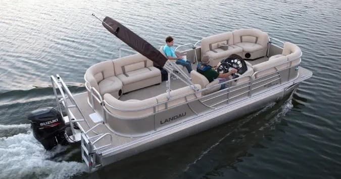Pontoon boat cruising on Smith Lake calm waters with passengers