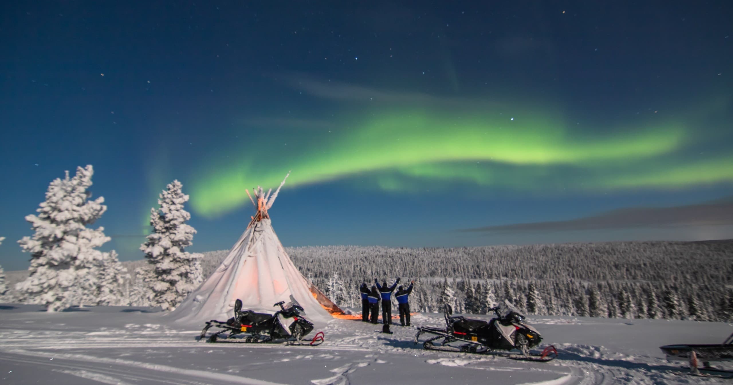 Winter Adventure: Aurora Hunting with Snowmobile at Northern Lights Village Pyhä