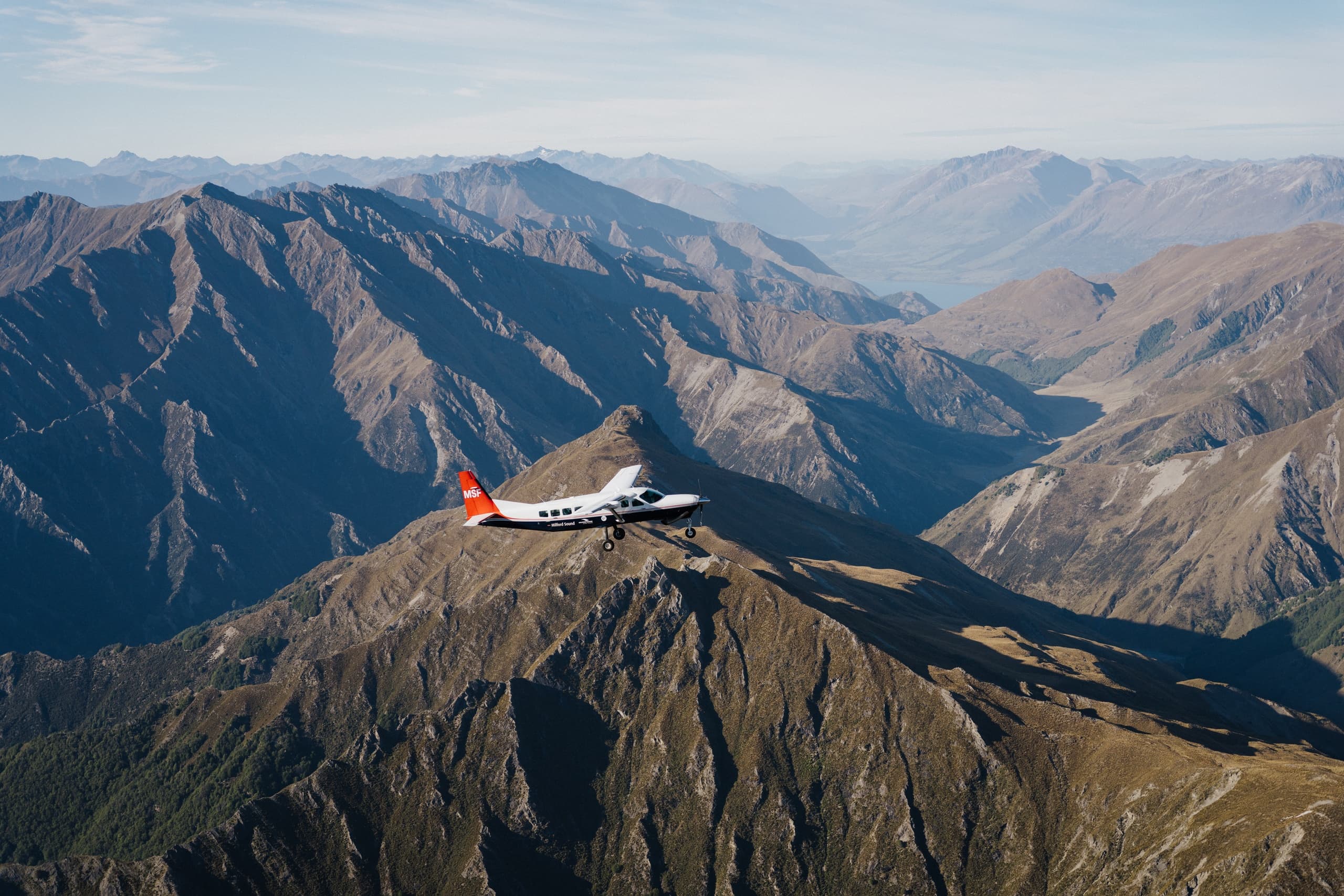 Experience Milford Sound: Scenic Flight and Wildlife Cruise from Queenstown