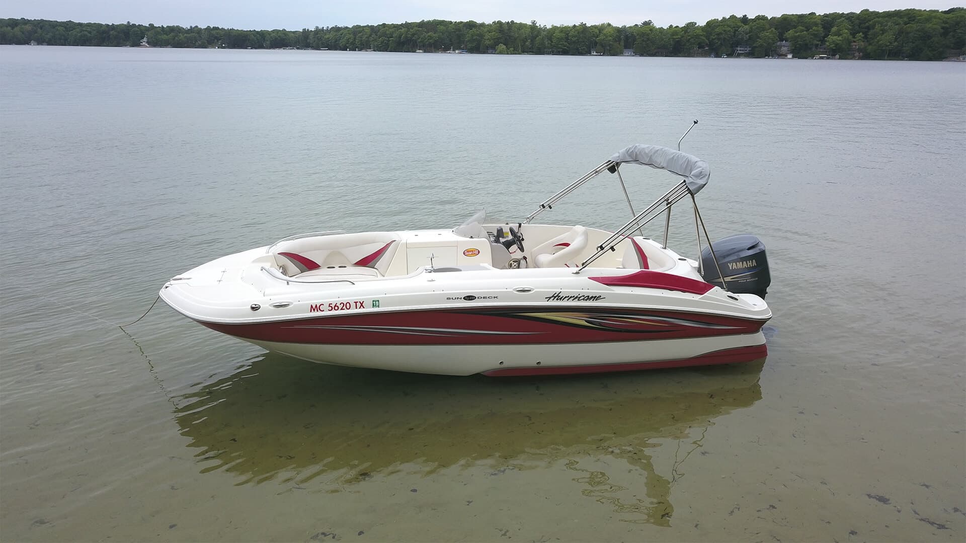 Explore Traverse City Waters with Red/Green Hurricane Boat Rental