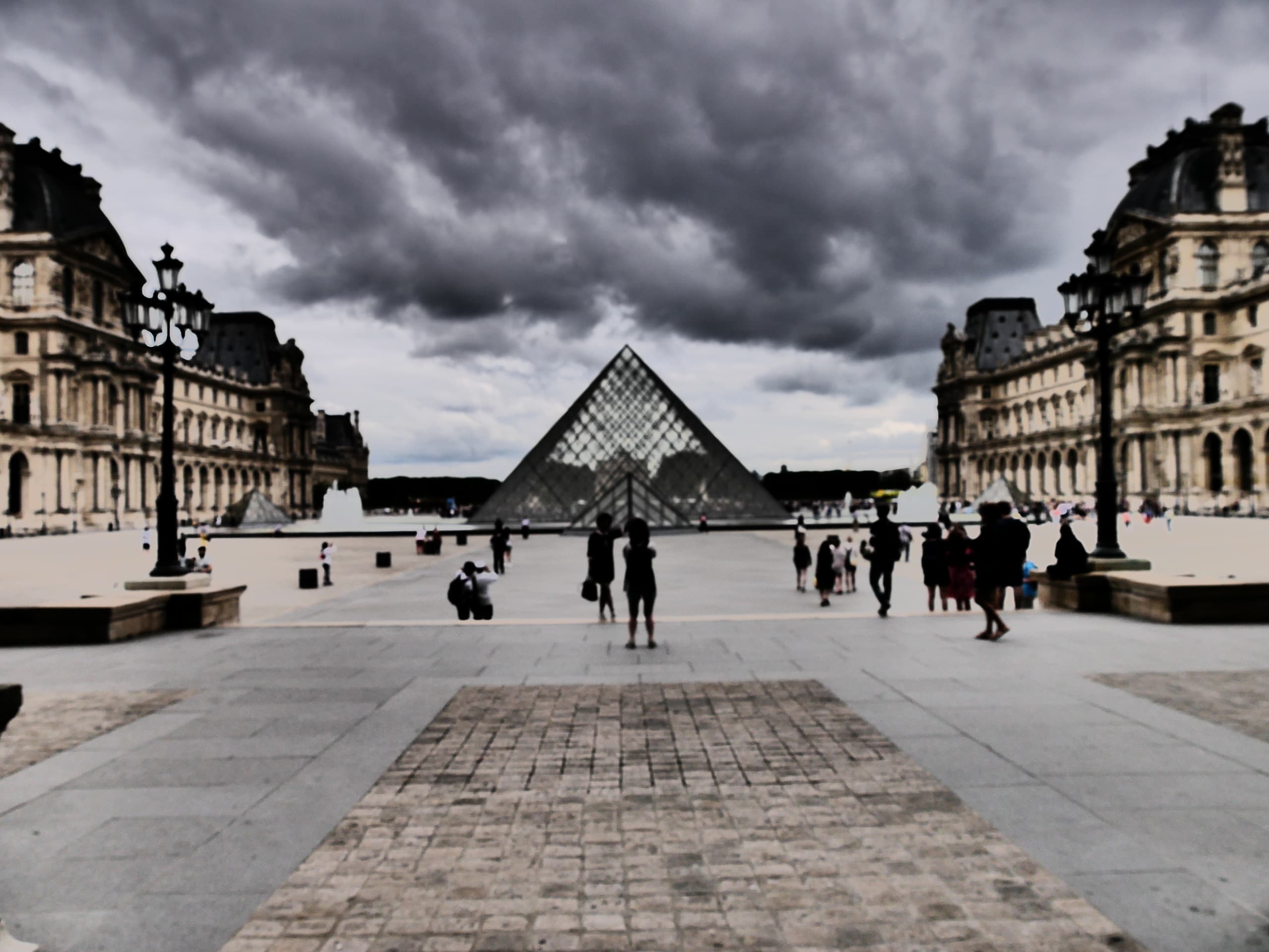Louvre Outdoor Walking Tour: Courtyards, Pyramid & Quiet Photography Walk photo 3