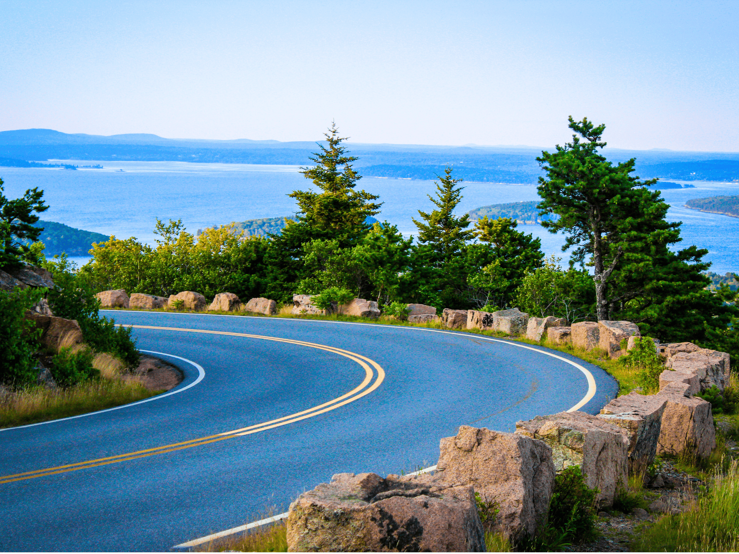 Winding coastal drive along ocean cliffs offering scenic overlooks