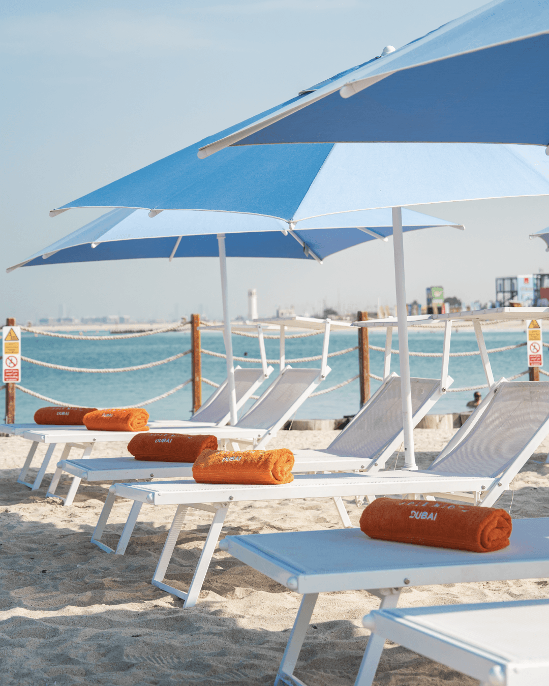 Dubai Beach Day Pass: Sunbeds, Umbrellas & Full-Day Access