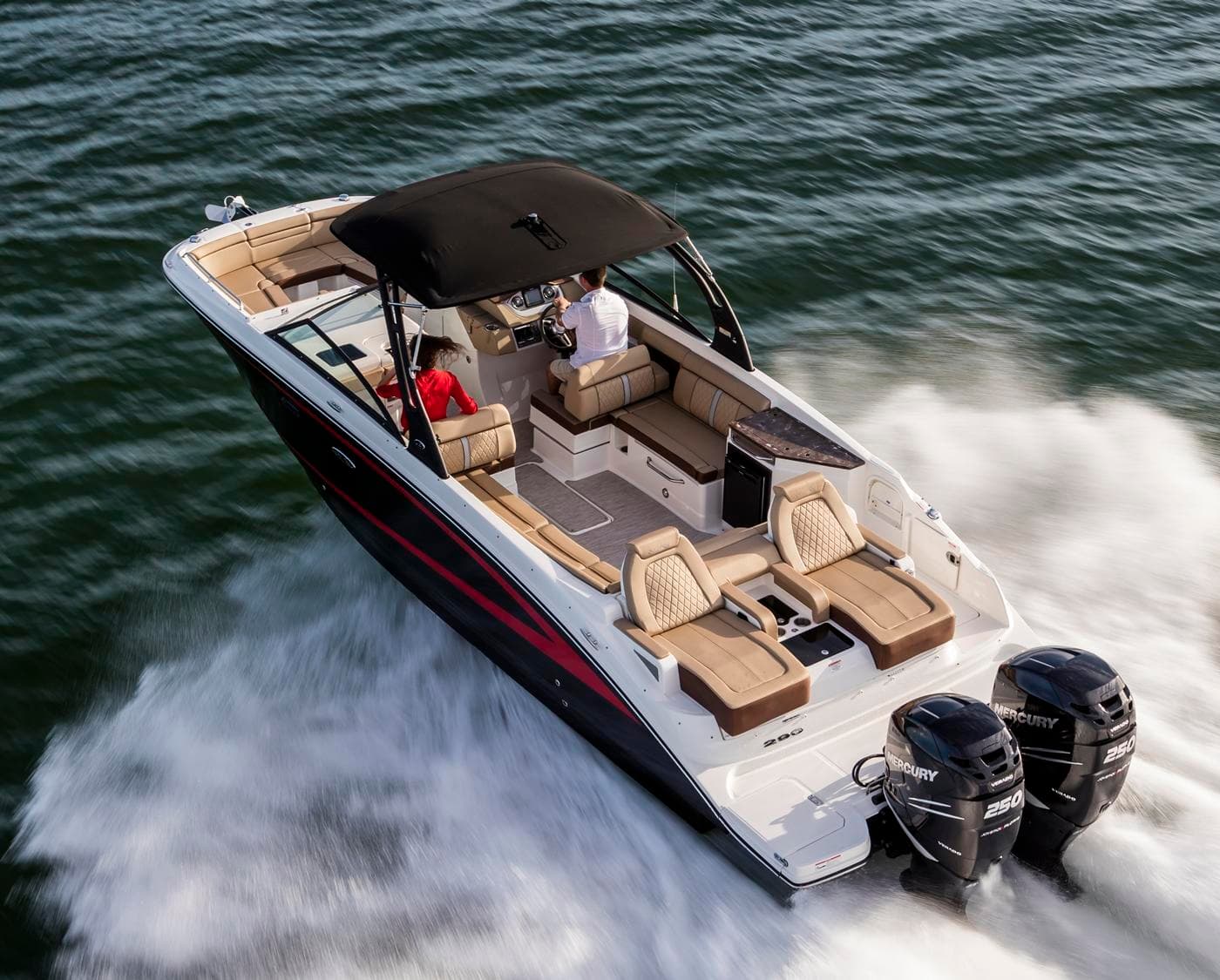 Speedboat rental cruising coastal waters with wake action