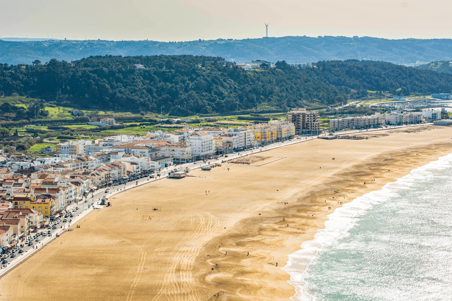 Aerial golden-sand beach panorama on Portugal coast, seaside leisure and waves