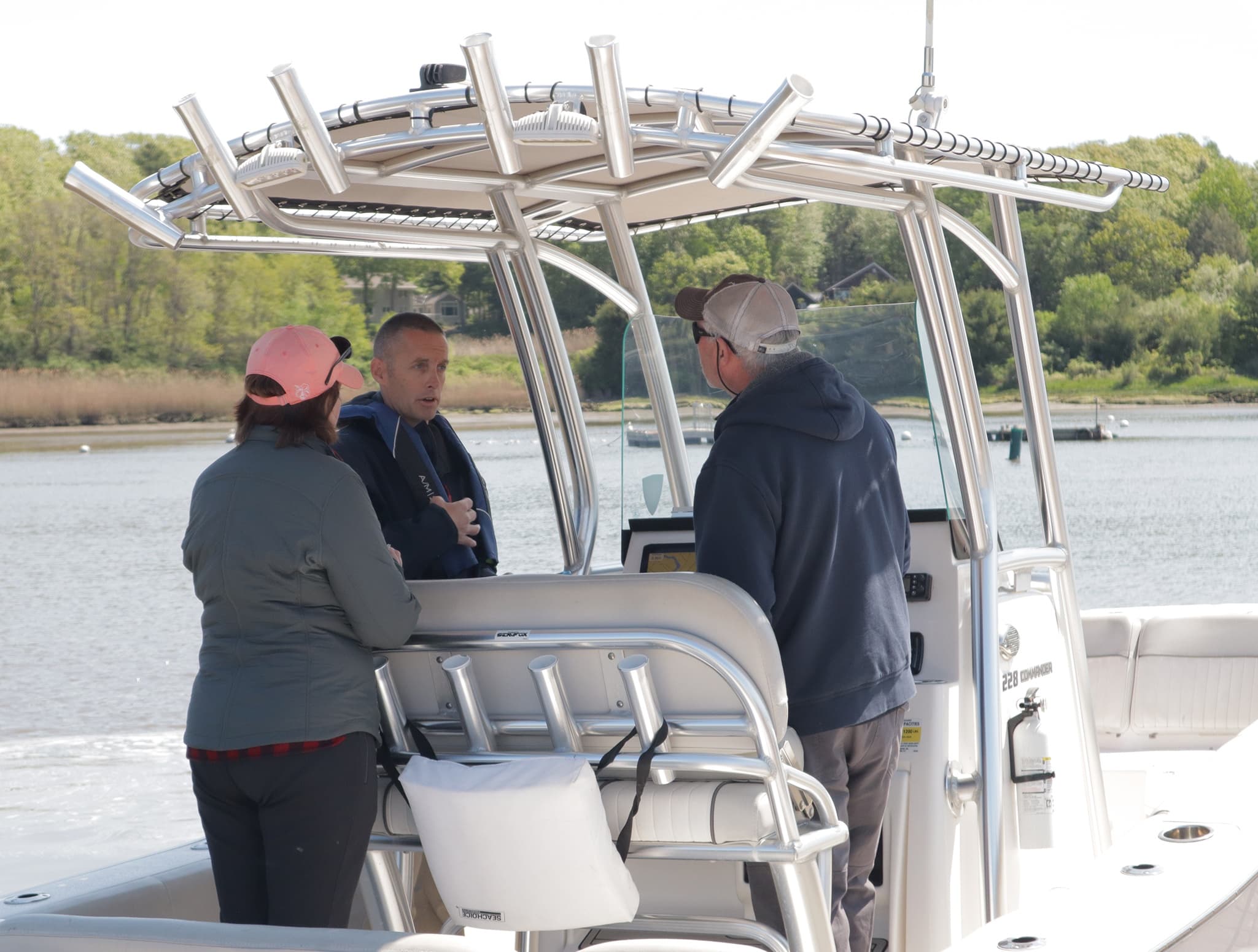 Boat lesson with instructor and students on coastal Maine waters